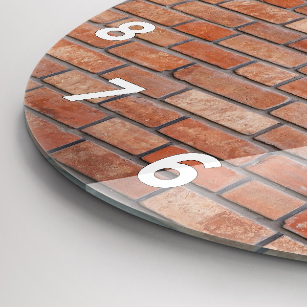 Round glass clock Brick wall