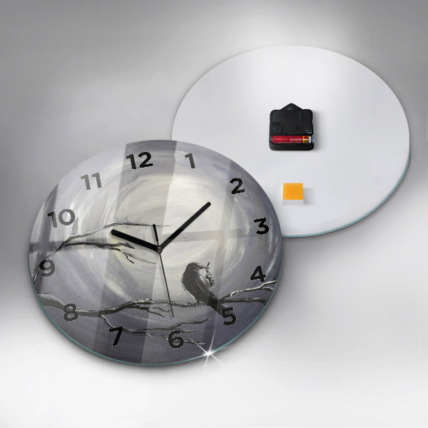 Round glass clock Raven in the moonlight