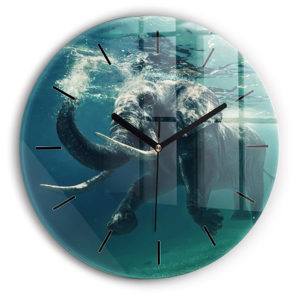 Round glass clock Swimming elephant in the ocean