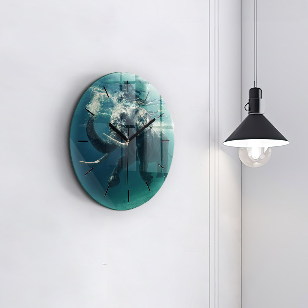 Round glass clock Swimming elephant in the ocean
