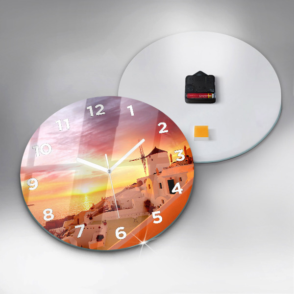 Round glass clock Old windmill in Santorini