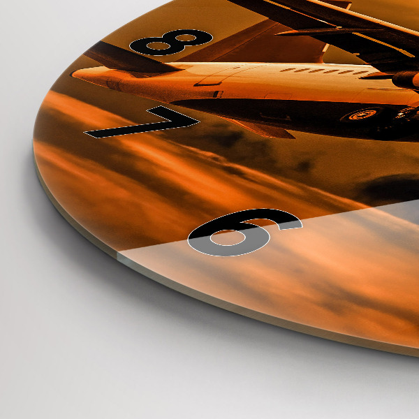 Round glass clock Travel by plane