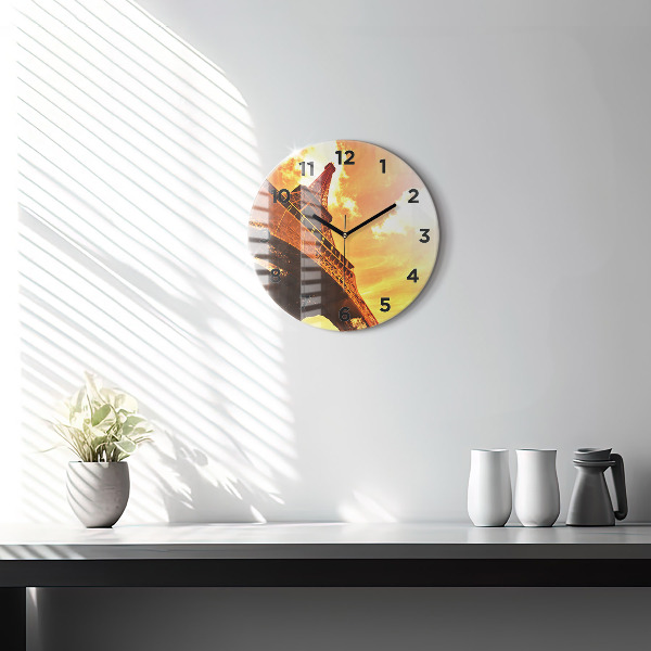Round glass clock The Eiffel Tower in Paris