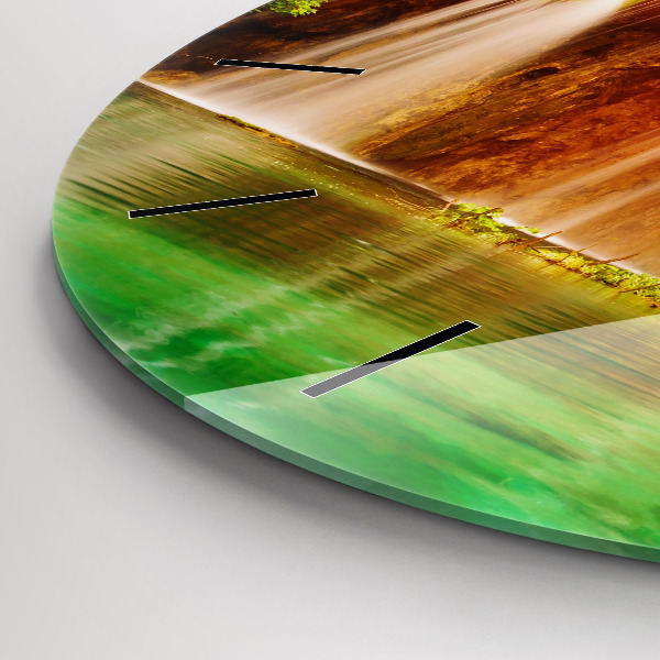 Round glass clock View of the waterfall