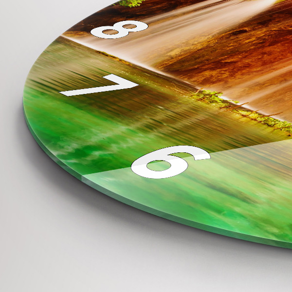 Round glass clock View of the waterfall