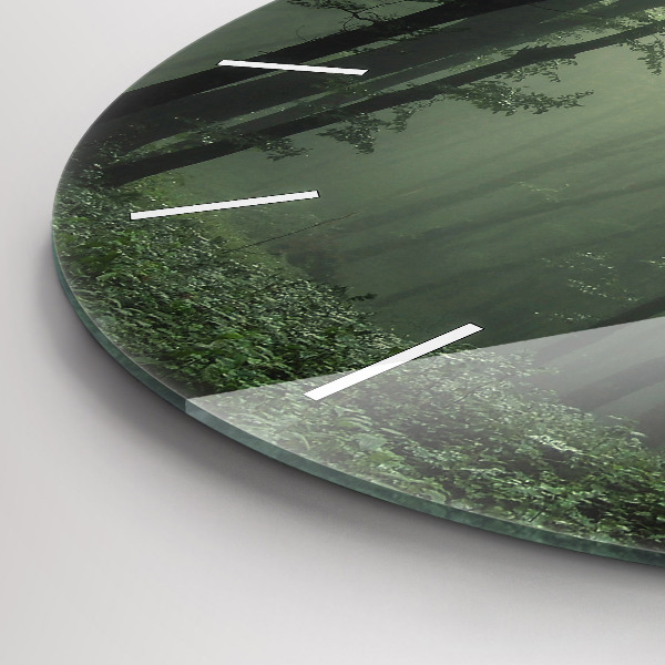Round glass clock Misty forest in the morning