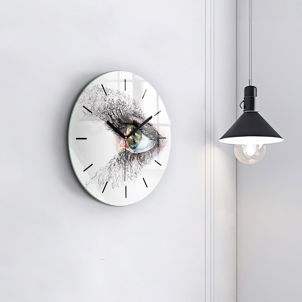 Round glass clock Drawing of a human eye