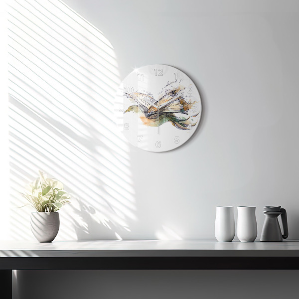 Round glass clock The bird and the book