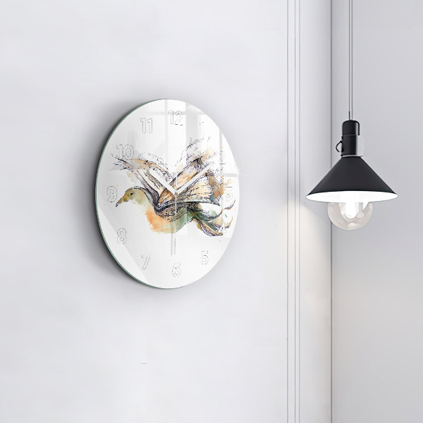 Round glass clock The bird and the book
