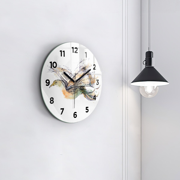 Round glass clock The bird and the book