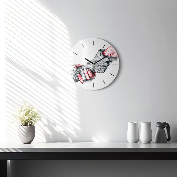 Round glass clock Holding hands