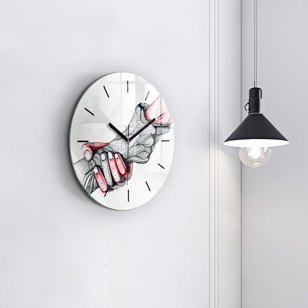 Round glass clock Holding hands