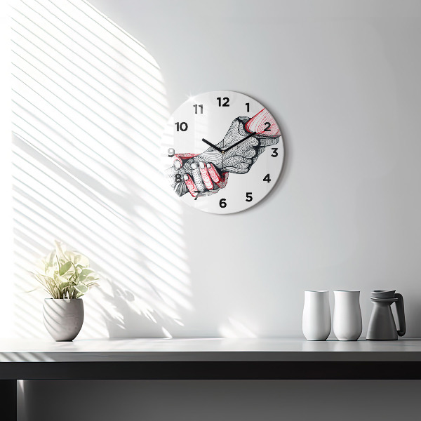 Round glass clock Holding hands