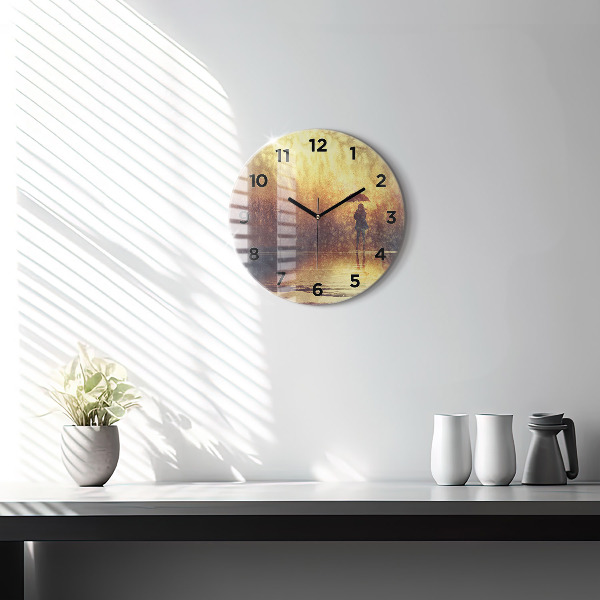 Round glass clock woman with umbrella