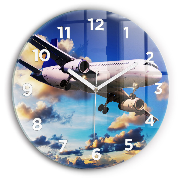 Round glass clock Airplane in the clouds