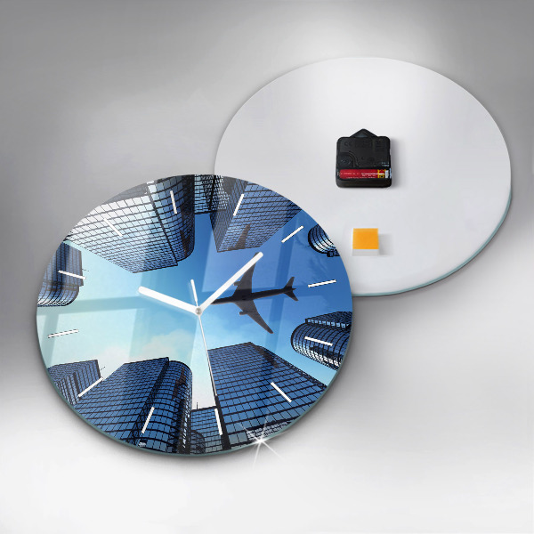 Round glass clock Airplane over buildings