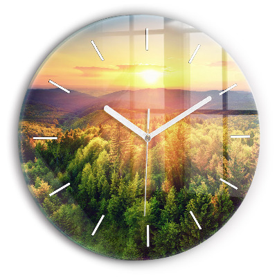 Round glass clock Sunset over the hills