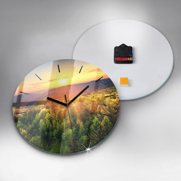 Round glass clock Sunset over the hills