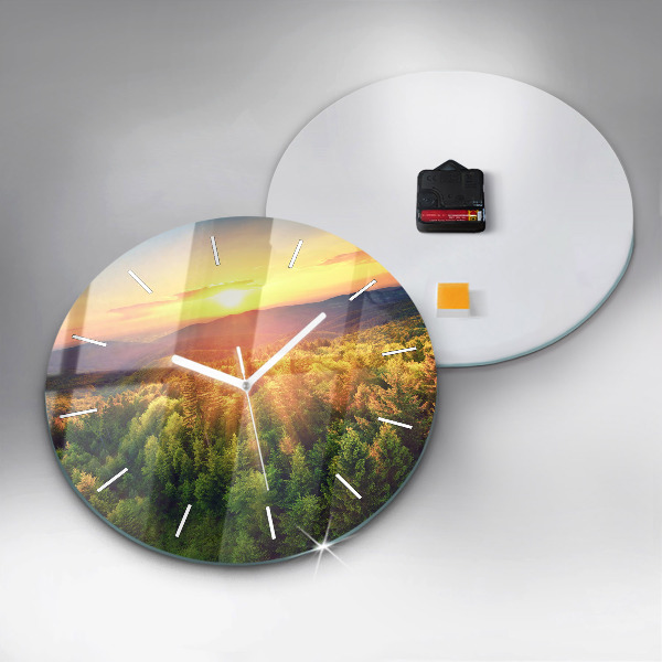 Round glass clock Sunset over the hills