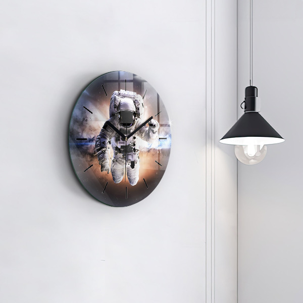 Round glass clock Astronaut in space