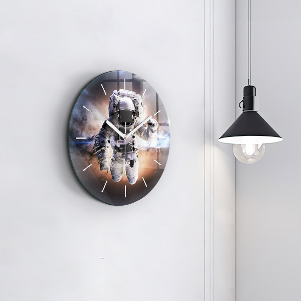 Round glass clock Astronaut in space