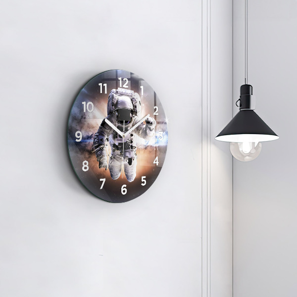 Round glass clock Astronaut in space