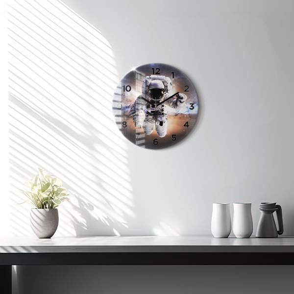 Round glass clock Astronaut in space
