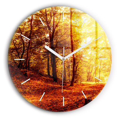 Round glass clock Forest landscape in the sun