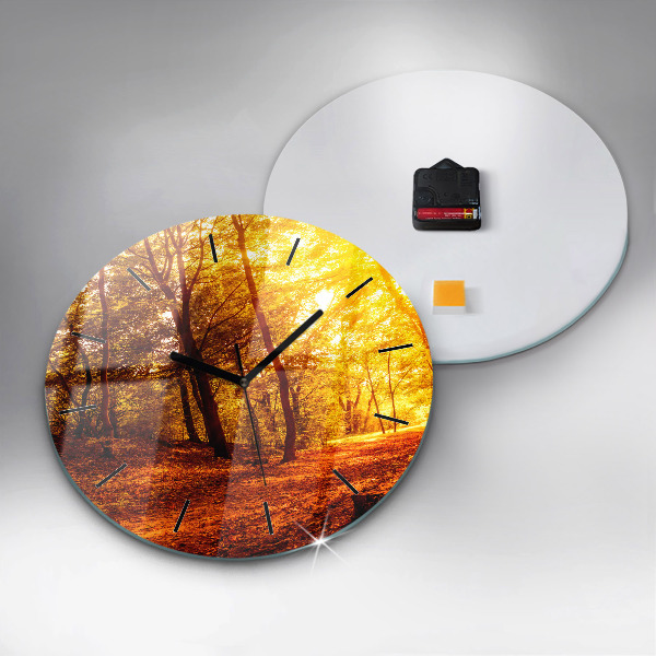 Round glass clock Forest landscape in the sun