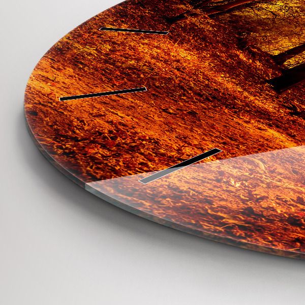 Round glass clock Forest landscape in the sun