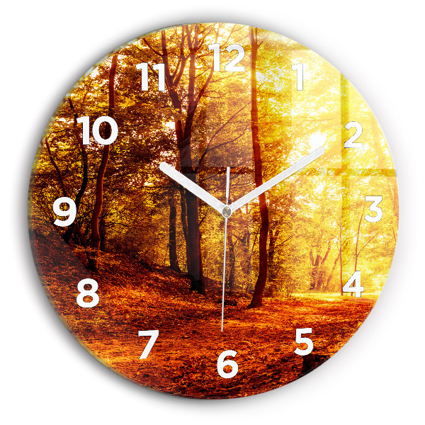 Round glass clock Forest landscape in the sun