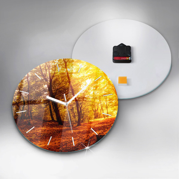 Round glass clock Forest landscape in the sun