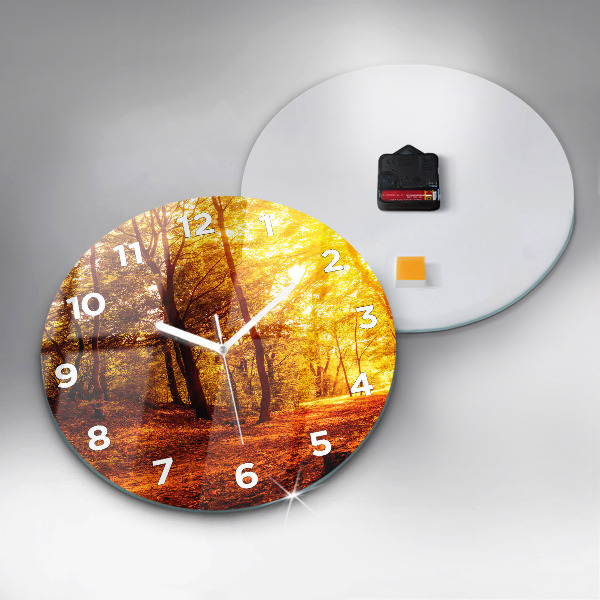 Round glass clock Forest landscape in the sun