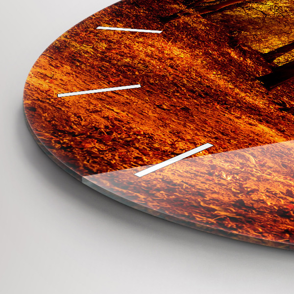 Round glass clock Forest landscape in the sun