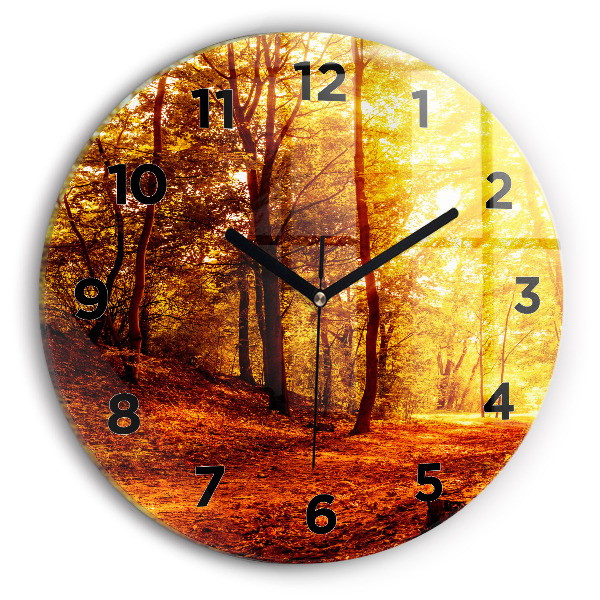 Round glass clock Forest landscape in the sun