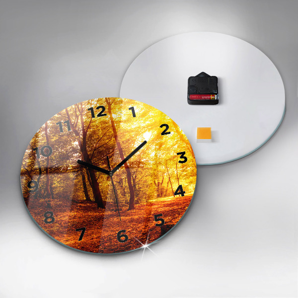 Round glass clock Forest landscape in the sun