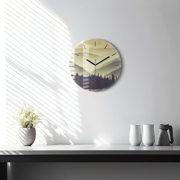 Round glass clock Misty mountain slopes