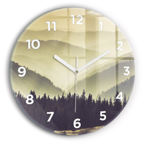 Round glass clock Misty mountain slopes