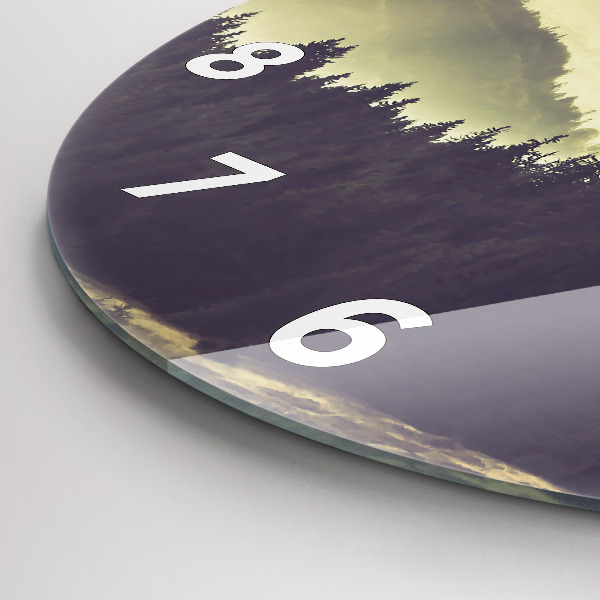 Round glass clock Misty mountain slopes