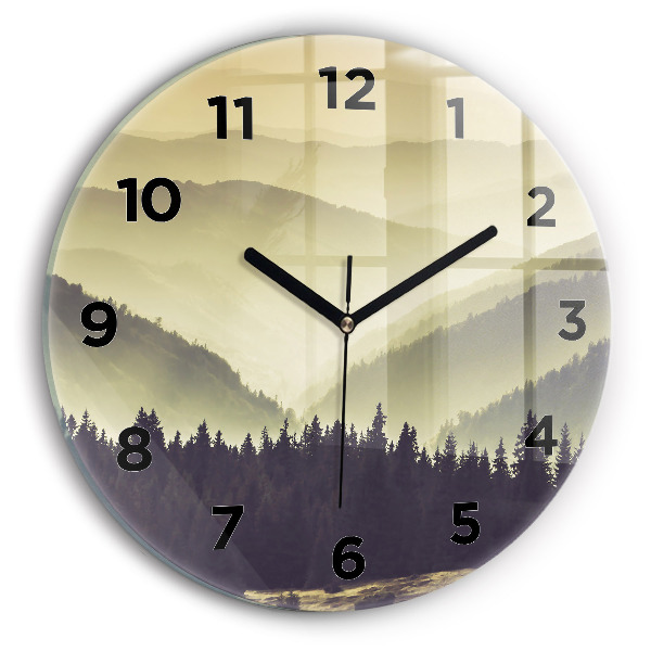 Round glass clock Misty mountain slopes