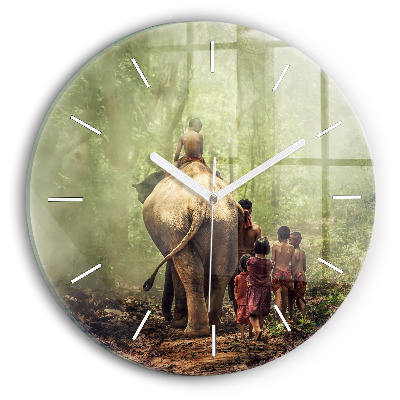 Round glass clock Children leading an elephant