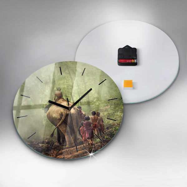 Round glass clock Children leading an elephant