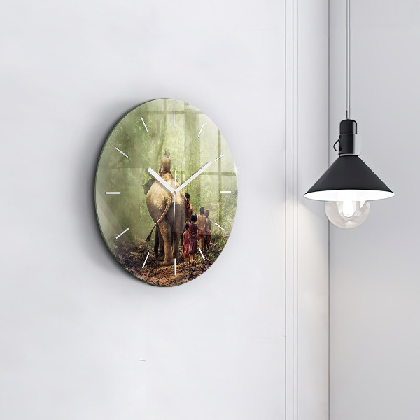 Round glass clock Children leading an elephant