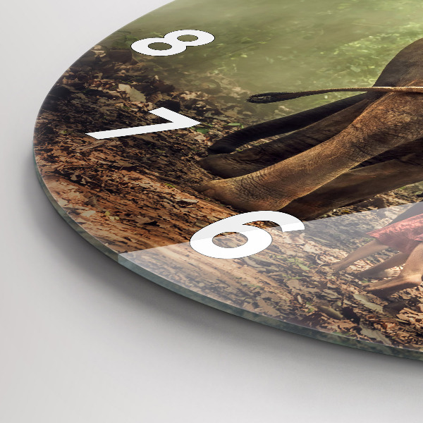 Round glass clock Children leading an elephant