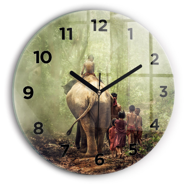 Round glass clock Children leading an elephant
