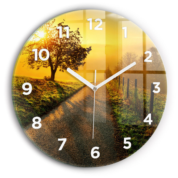 Round glass clock Fog at sunrise
