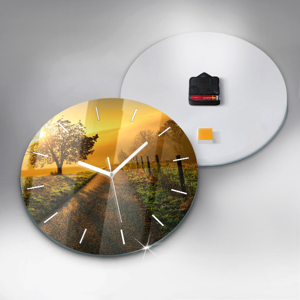 Round glass clock Fog at sunrise