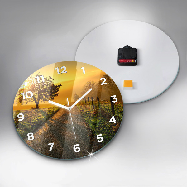 Round glass clock Fog at sunrise