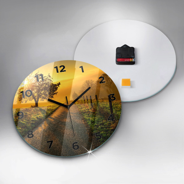 Round glass clock Fog at sunrise