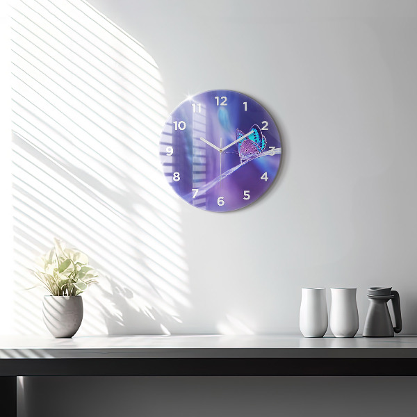 Round glass clock Butterfly on the grass